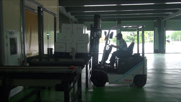 Forklift at Conveyor Loading Area